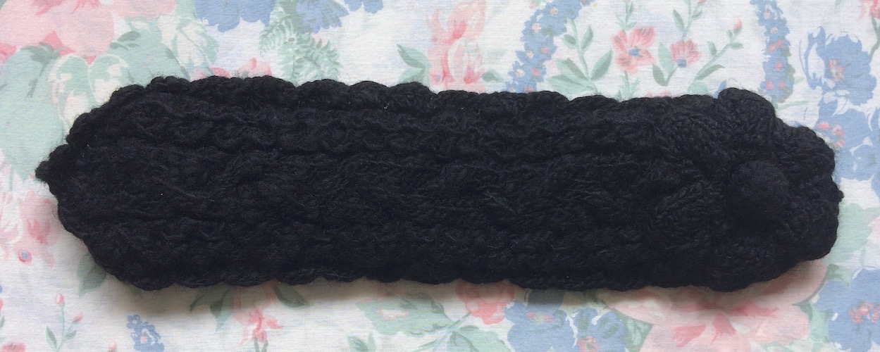 black knitted headdress