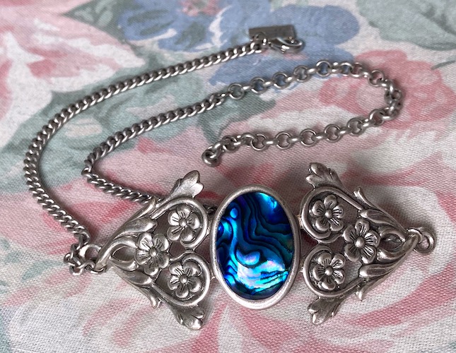 silver and blue necklace