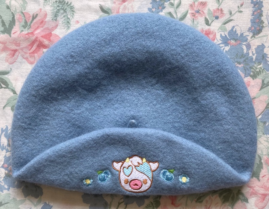 blue beret with cow embroidery
