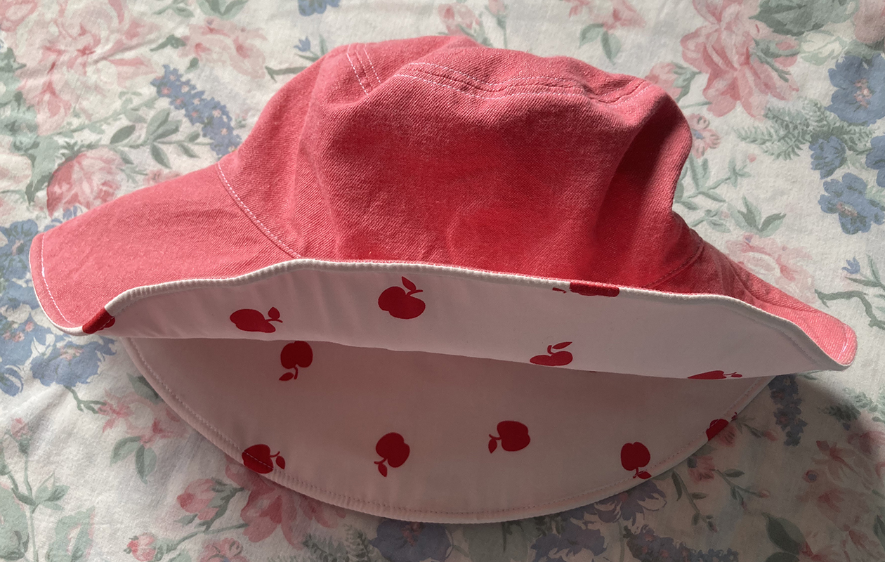 pink hat with cherries