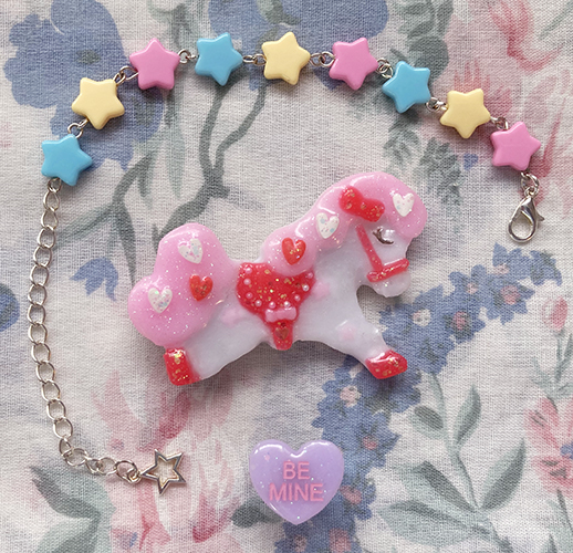 pony brooch, heart ring and star bracelet