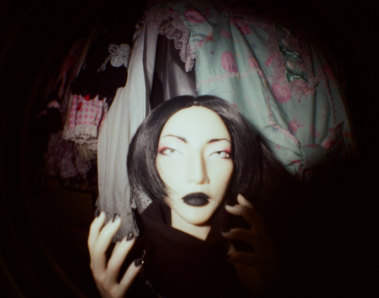 KYM fisheye in front of wardrobe