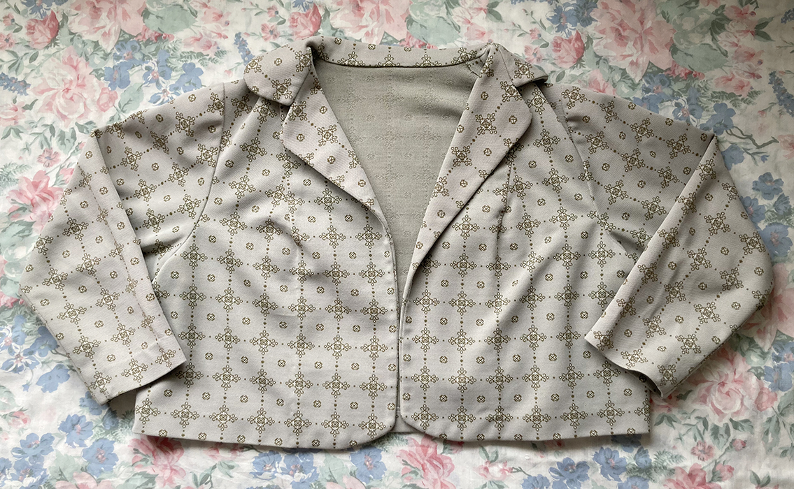 green cropped jacket