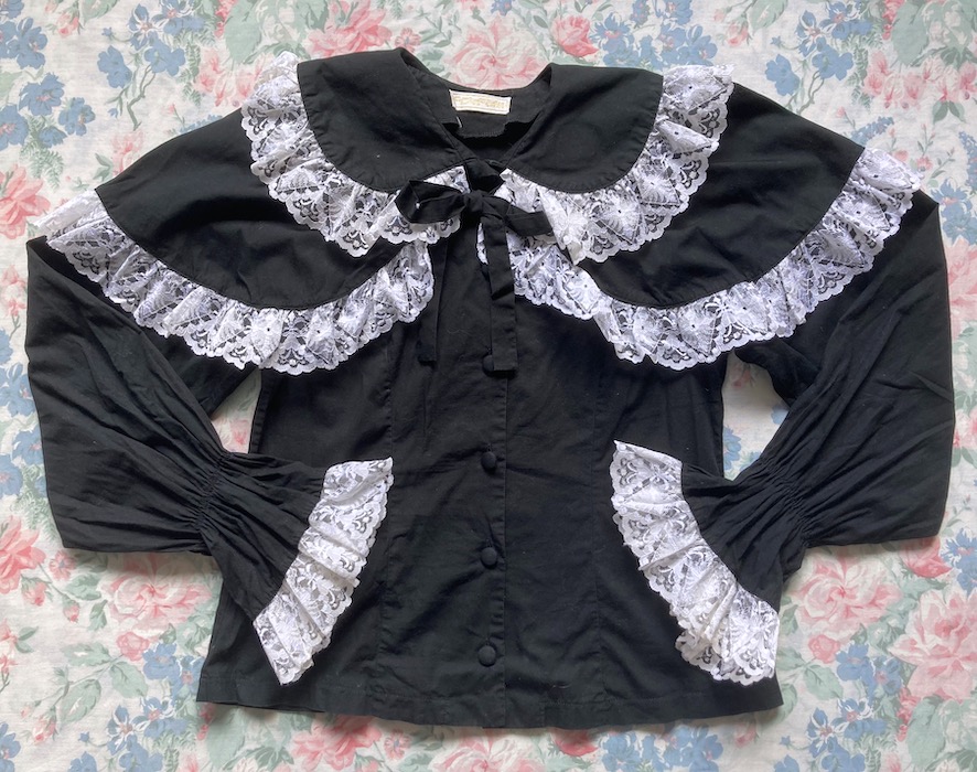 black and white blouse with cape