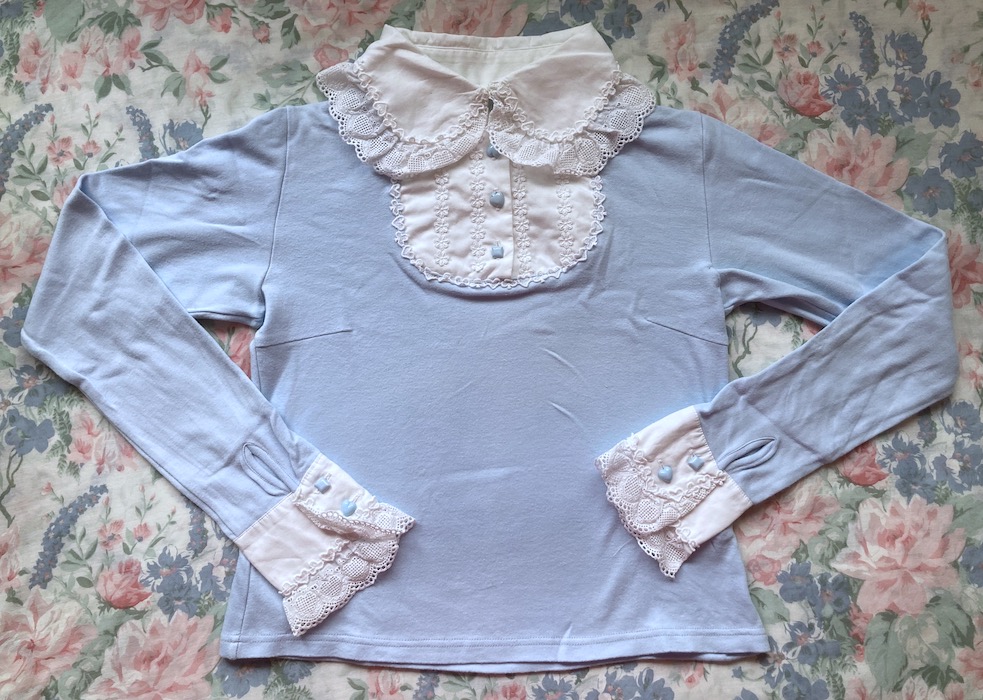 blue and white long sleeve top