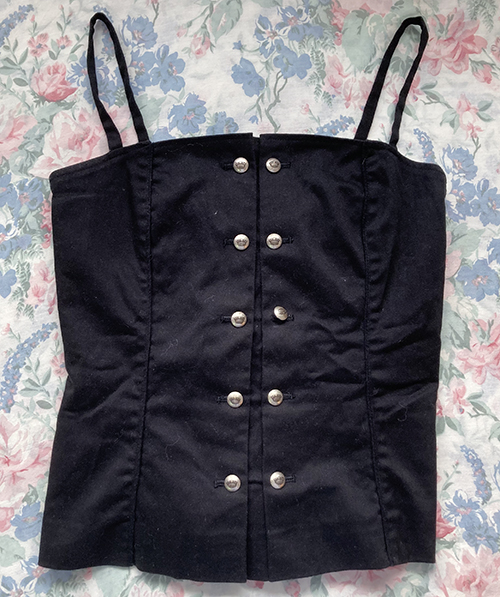black bustier with gold buttons