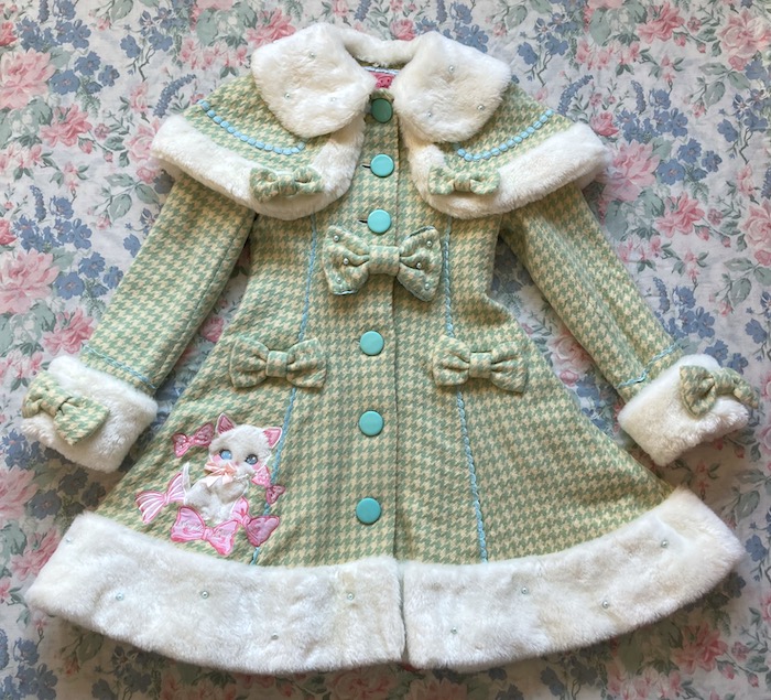 green houndstooth coat with cat applique