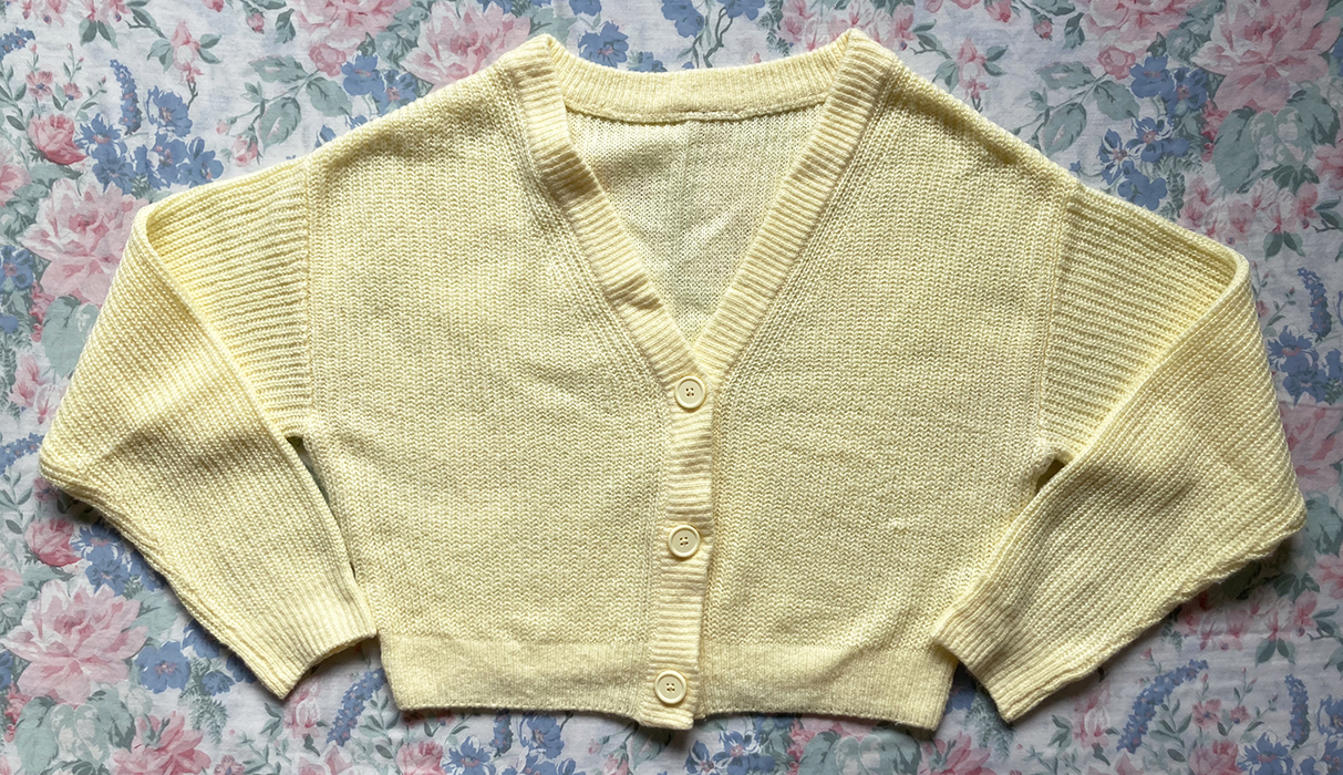 yellow cardigan